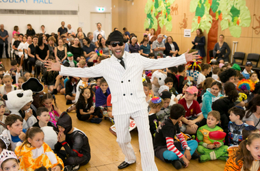 Rabbi Yossi offering support to someone in a community gathering